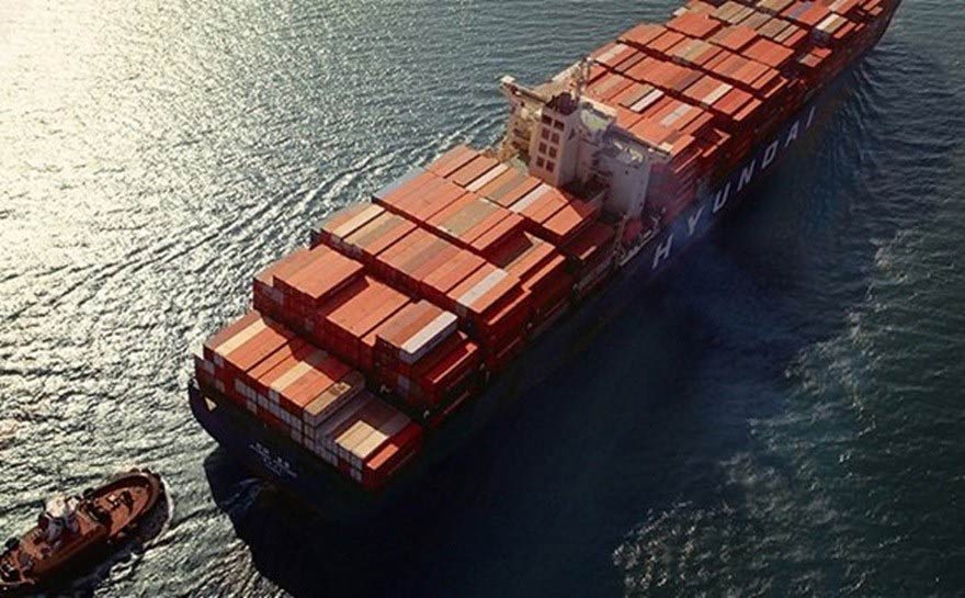 Container cargo ships transit large goods for export by sea 