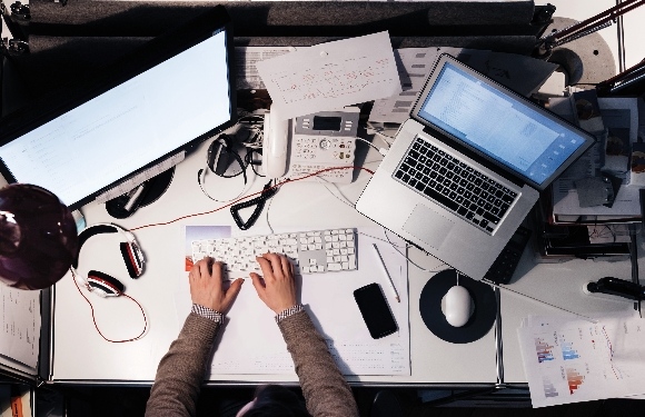 man accessing all his business banking accounts with a single sign-on man accessing all his business banking accounts with a single sign-on