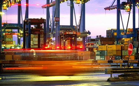 Container cargo ships loaded with large goods for import at shipping port Container cargo ships loaded with large goods for import at shipping port