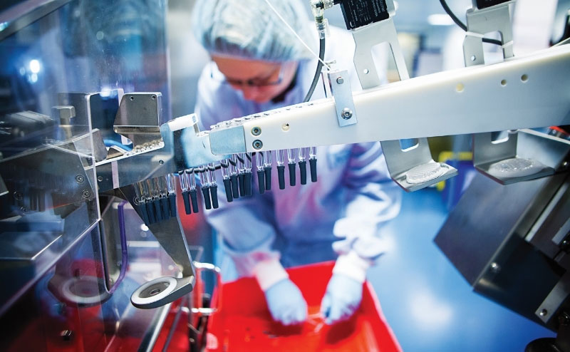 Woman working in laboratory for the largest pharmaceutical distributor in Malaysia Woman working in laboratory for the largest pharmaceutical distributor in Malaysia